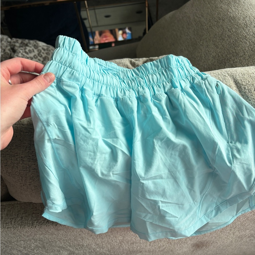 teal Lululemon running shorts size 4